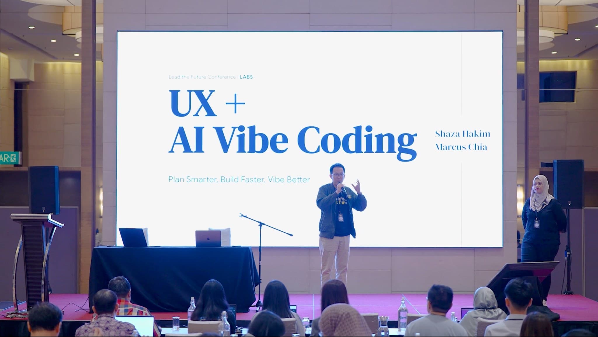 Marcus Chia presenting at UX + AI Vibe Coding conference